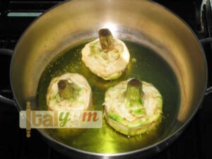 Artichokes with pancetta (Carciofi con pancetta) | Vegetable recipes